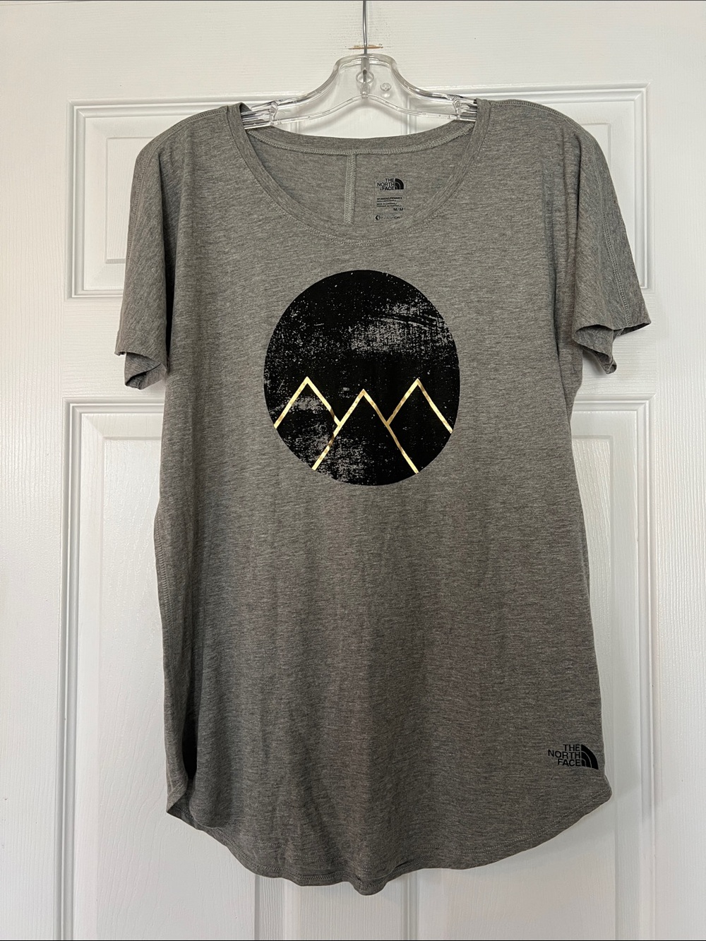 The North Face Gray Short Sleeve Tee with Black & Gold Mountain Graphic